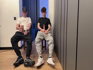 Two lads jerking off uncut dick and cum